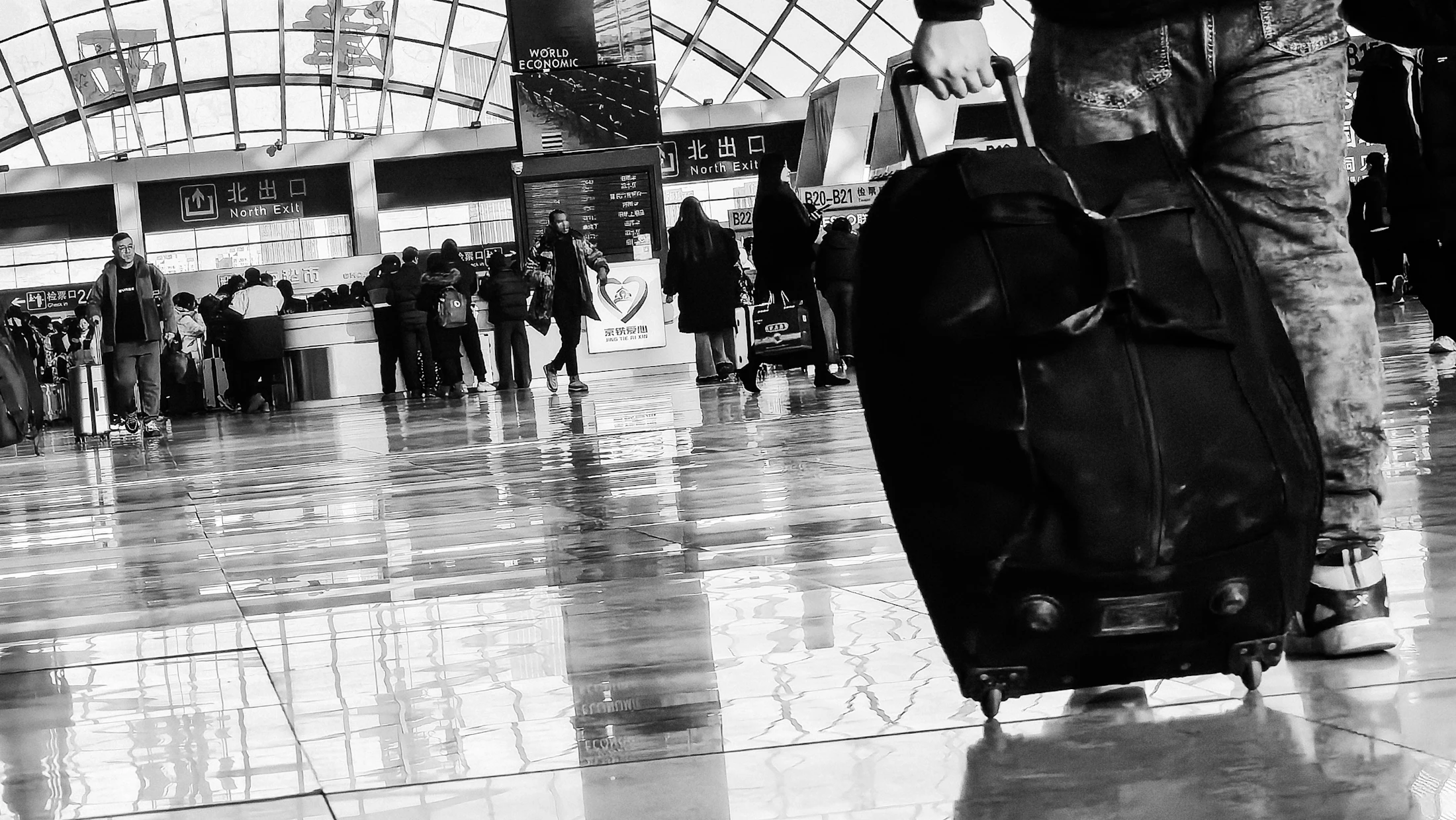 A traveler heading through the airport